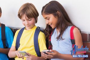 Should Cellphones be Banned by Law in Schools?