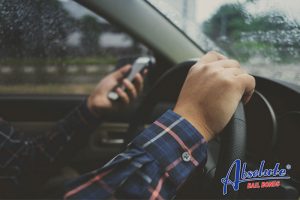 absolute bail bonds texting and driving